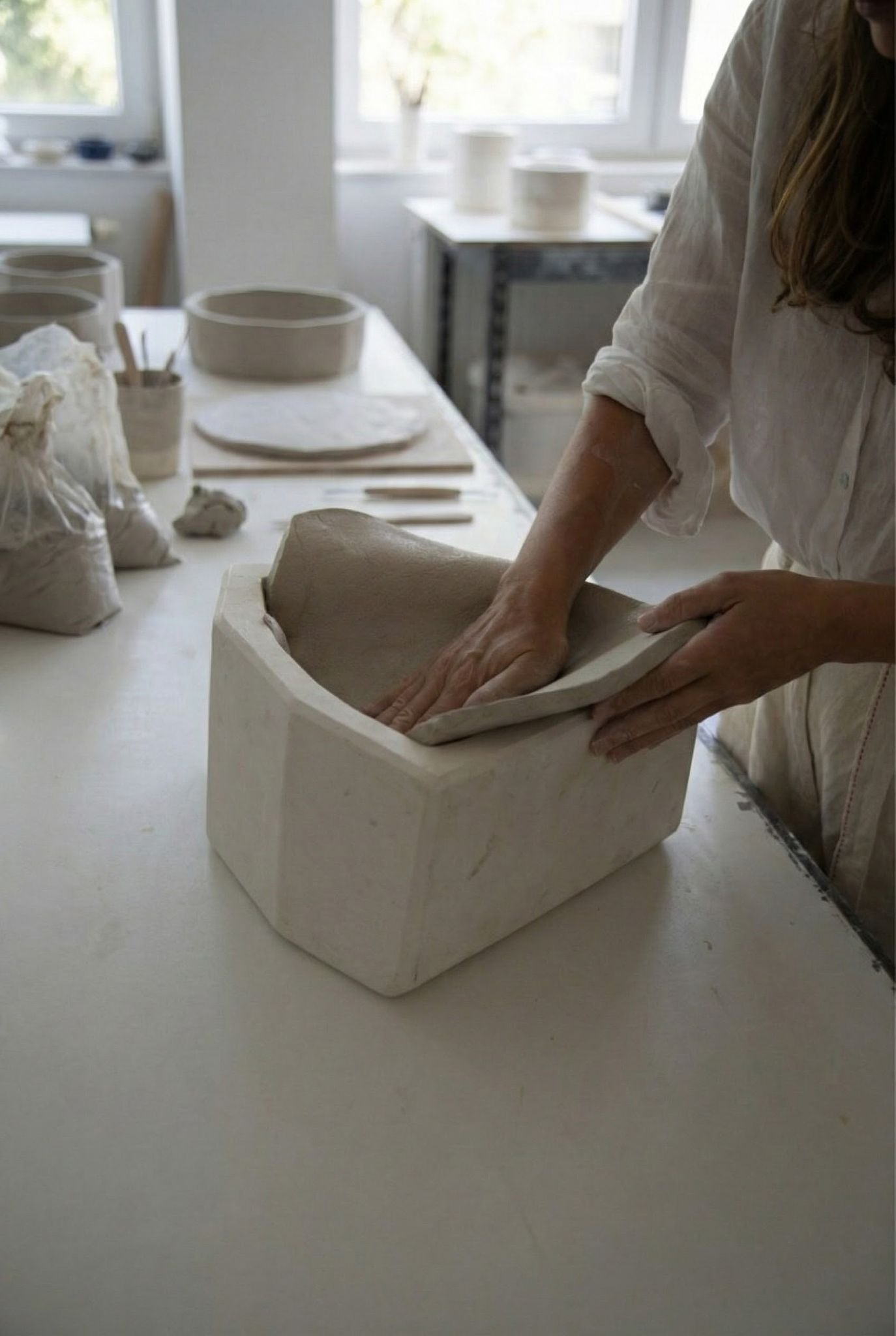 PLASTER TIERED WALL SCONCE | CLTOR026