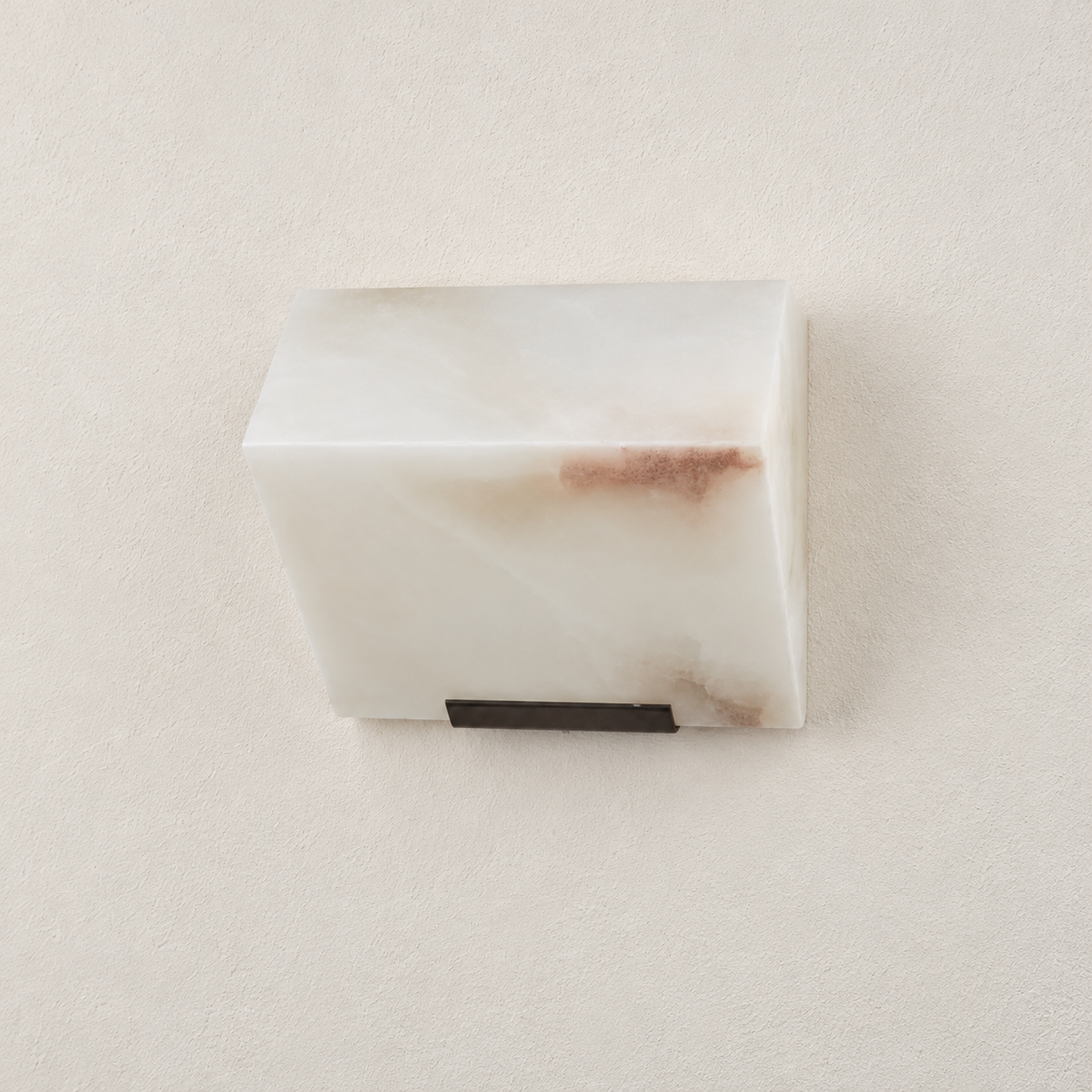Single alabaster block wall sconce with a black lower support.