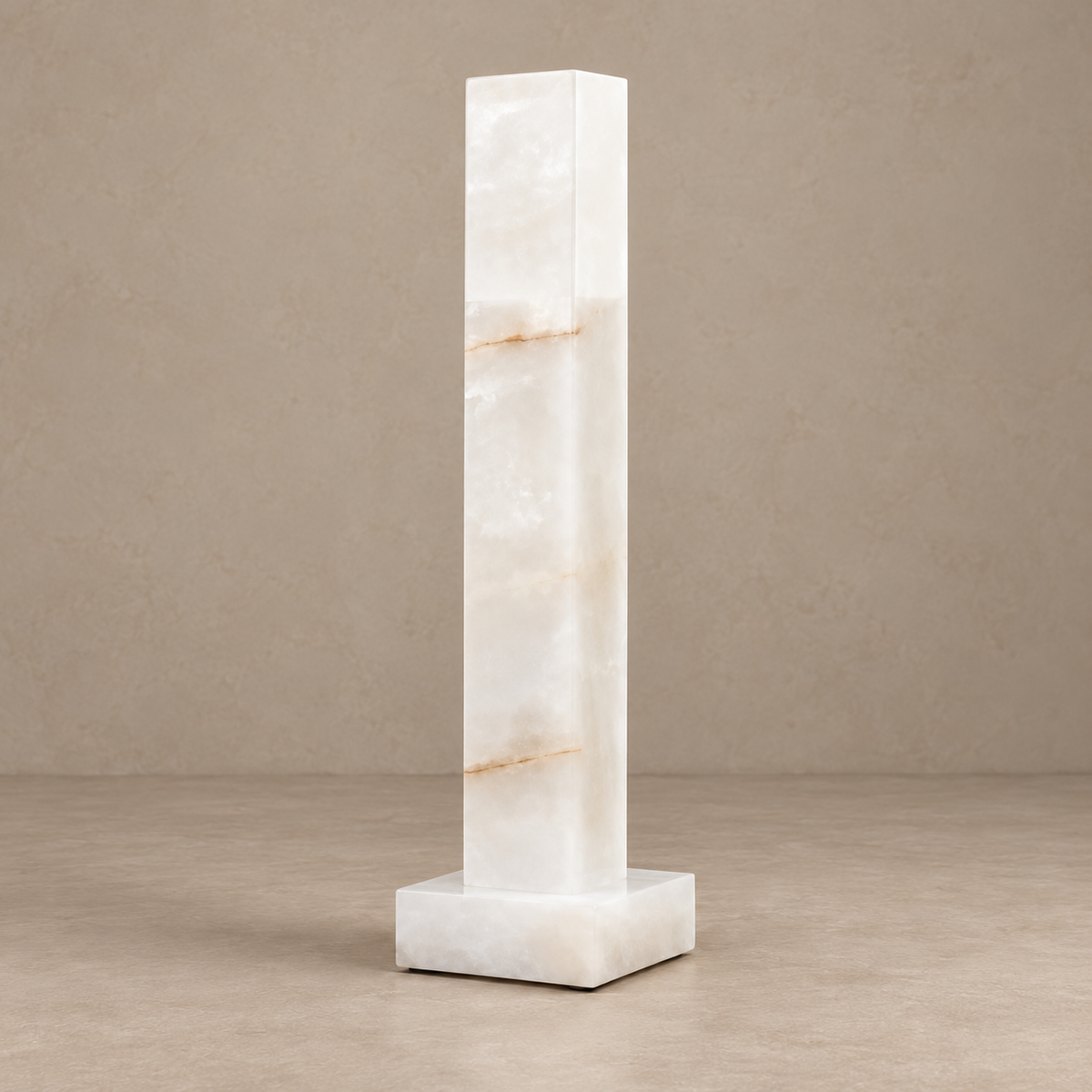Small CLKY085 alabaster column lamp switched off on its square stone base.