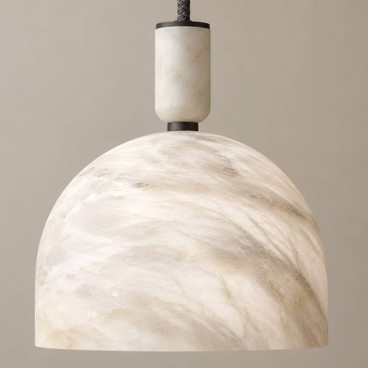 Close-up of the alabaster dome’s layered mineral texture and honed stone cap.