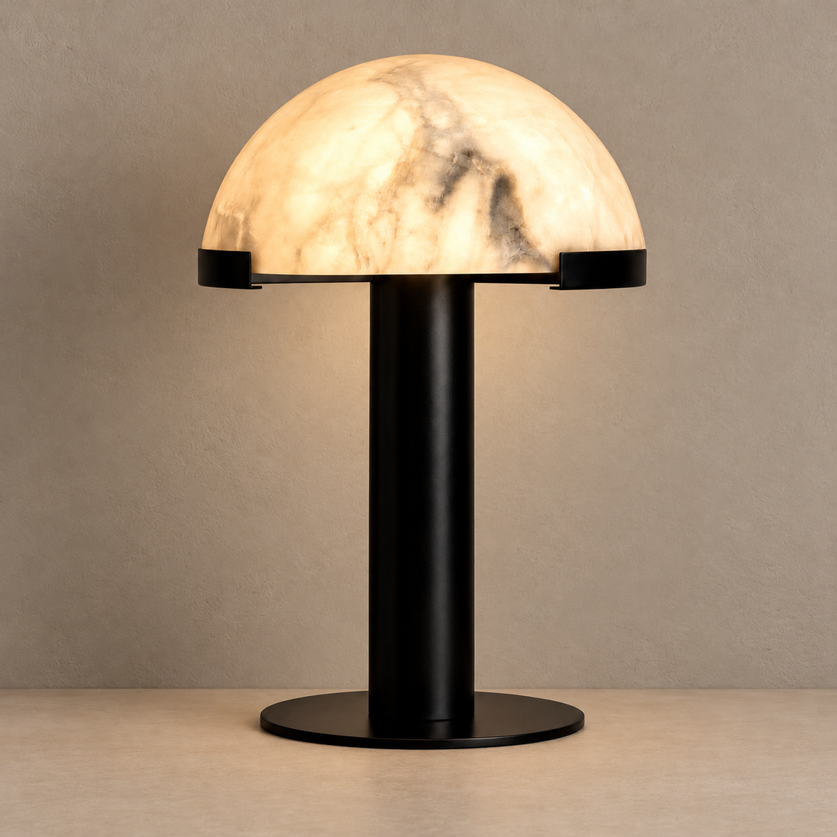 Black table lamp with illuminated alabaster dome and natural mineral clouds.