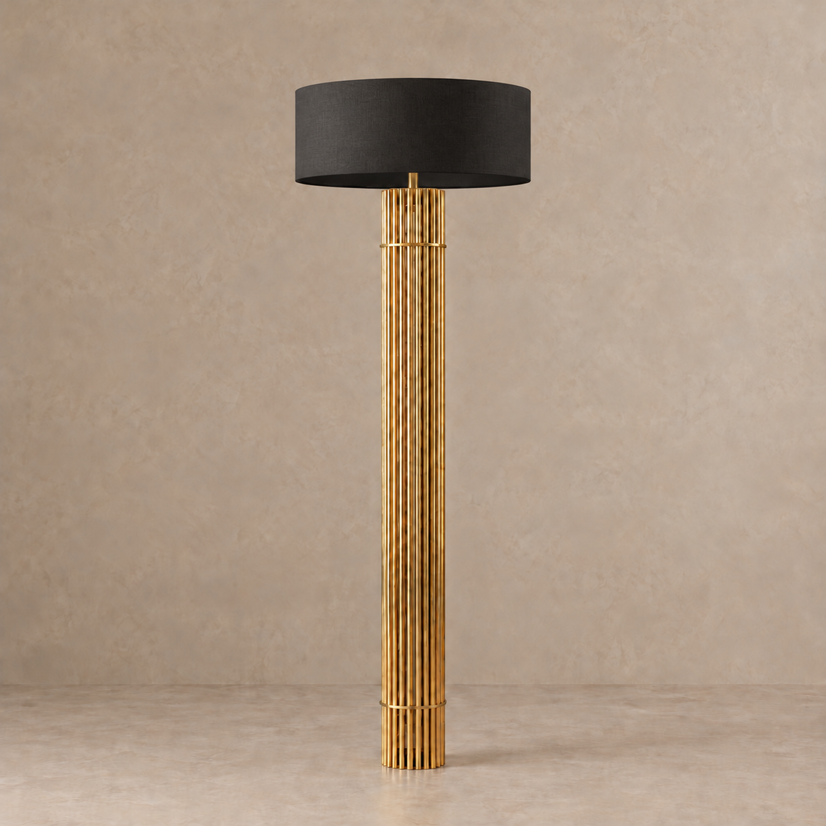 Fluted brass column floor lamp with a 55 cm black fabric drum shade, switched off.