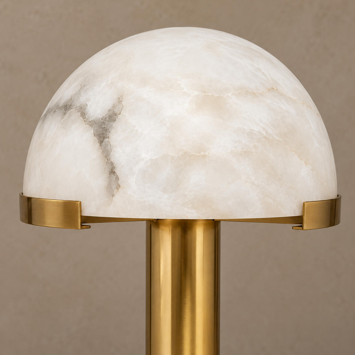 Detail of alabaster veining and a brass support clip.