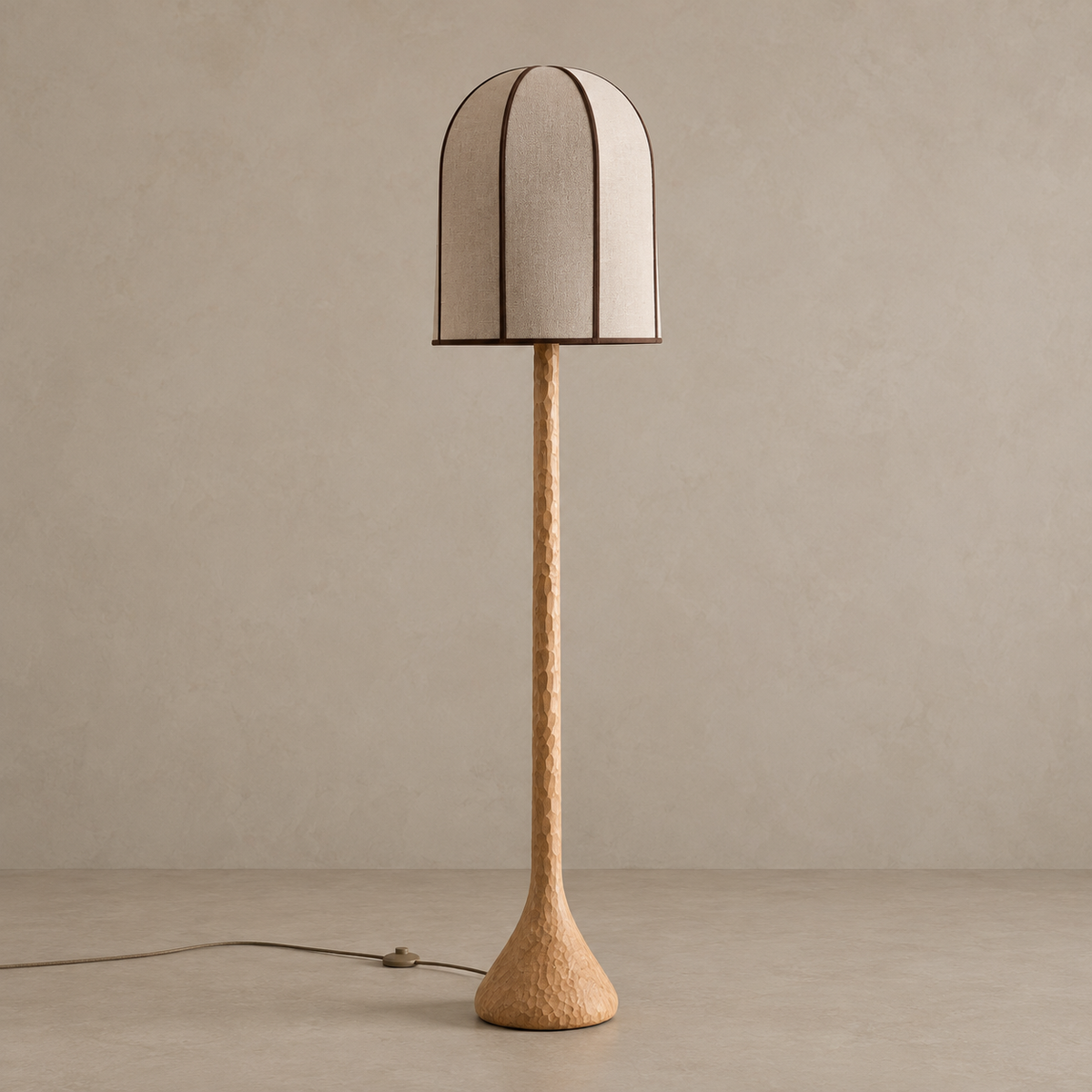 CL70ZZ floor lamp switched off, with a domed linen Bell shade and carved oak stem and base.
