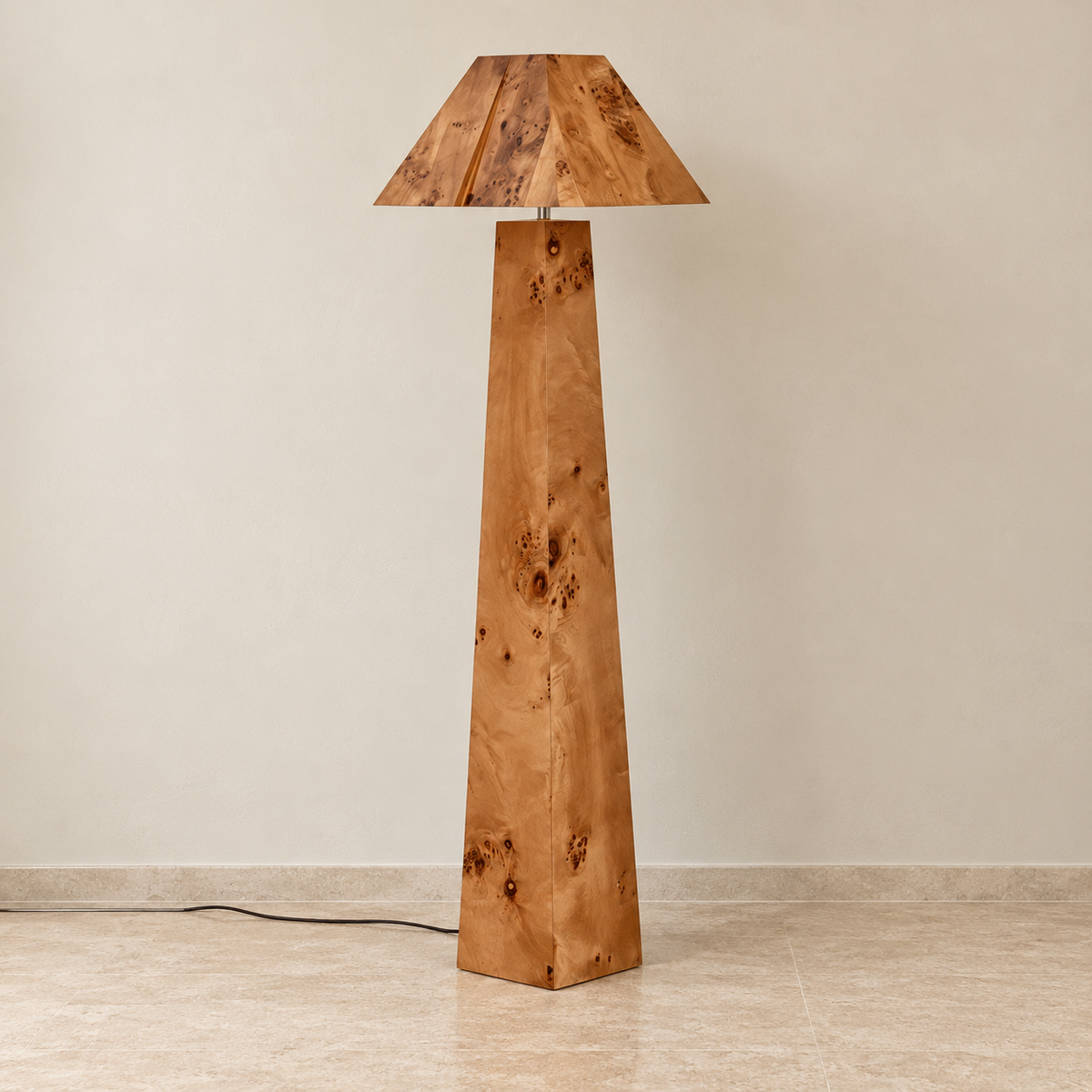 Burl wood floor lamp with a tapered faceted column and angular wooden shade, switched off.