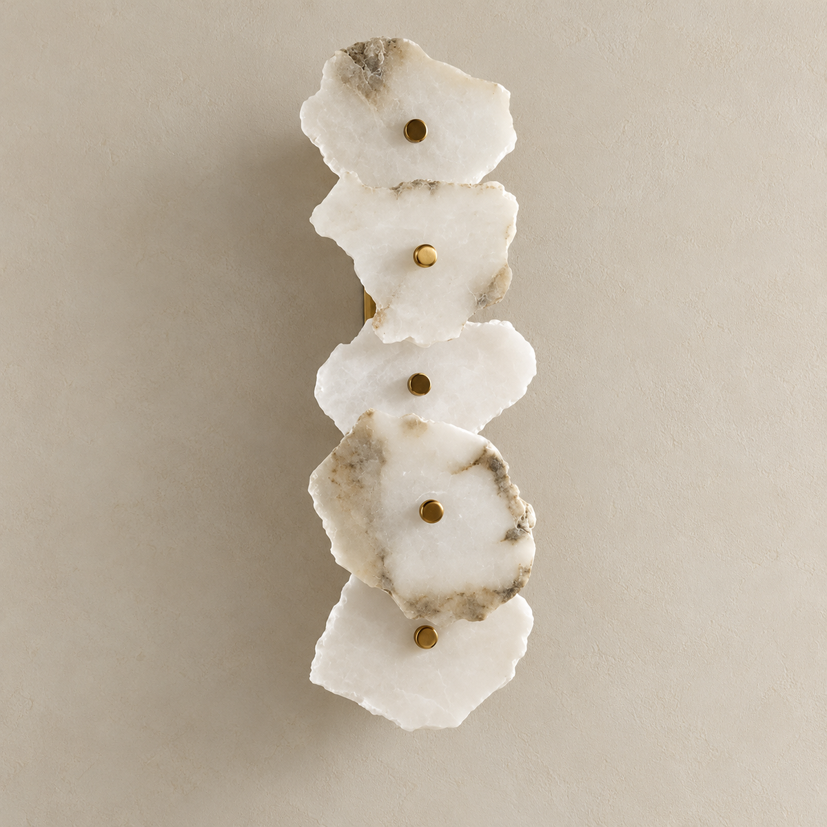 Unlit 5-stone marble wall sconce with irregular layered panels and brass retaining caps.
