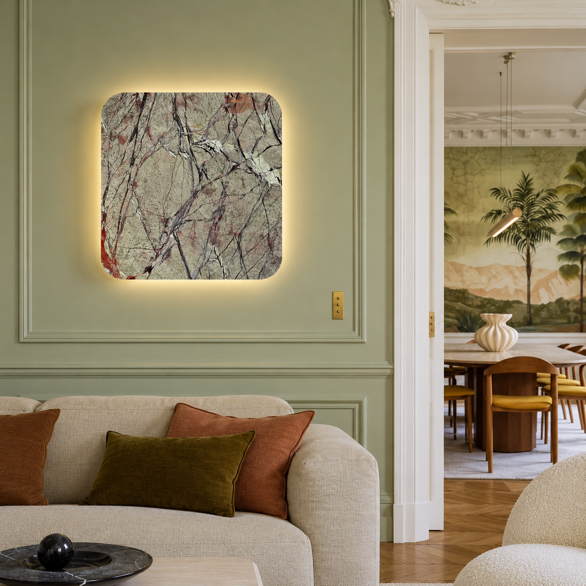 Green marble square wall light on a sage wall in a Parisian living room.