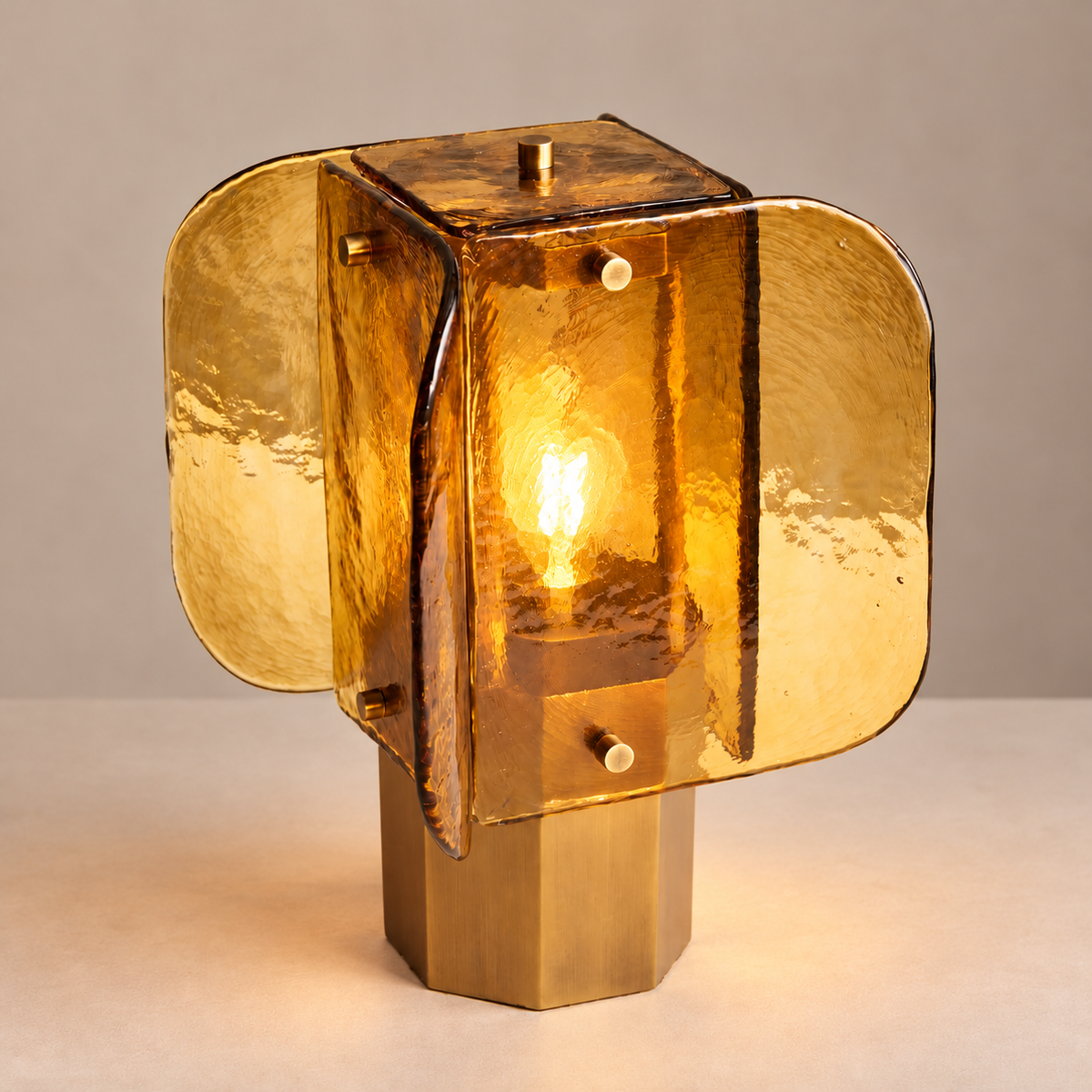 Layered amber glass table lamp illuminated
