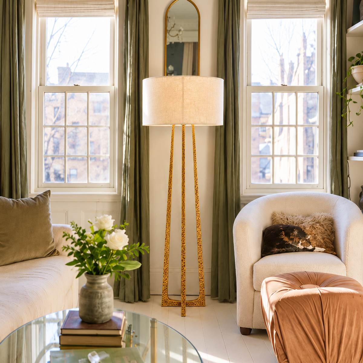 CLHJRH054 gold floor lamp between sash windows beside a cream armchair and olive curtains.