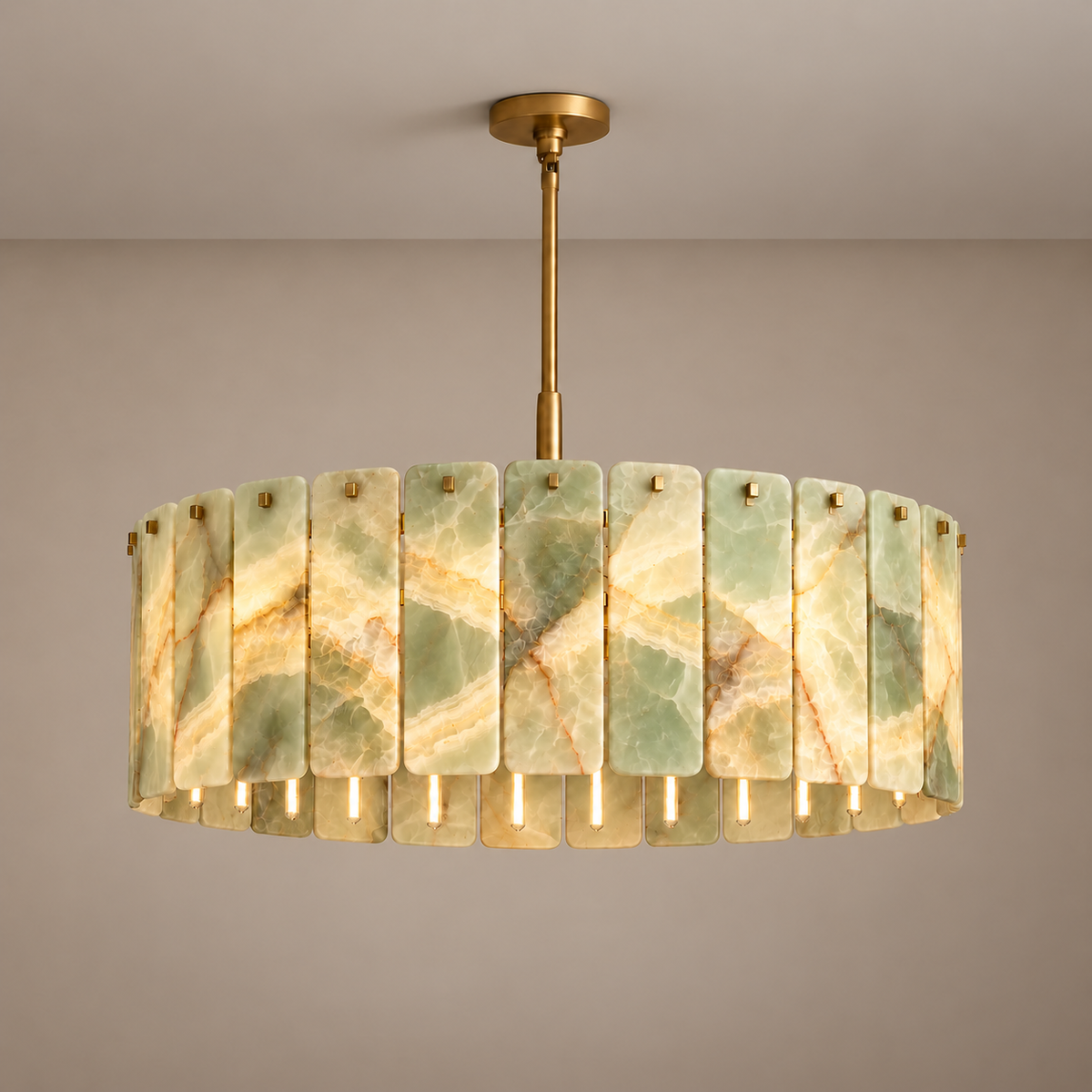 Matra Corona green onyx chandelier with brass frame, illuminated.
