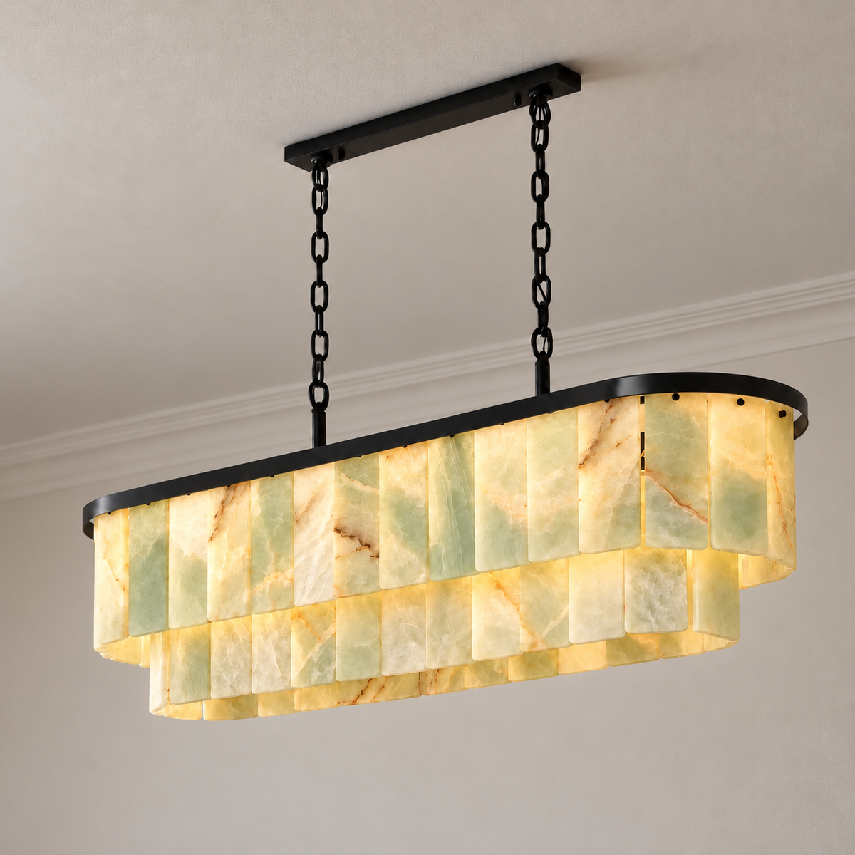 Green onyx linear chandelier with black frame, illuminated.