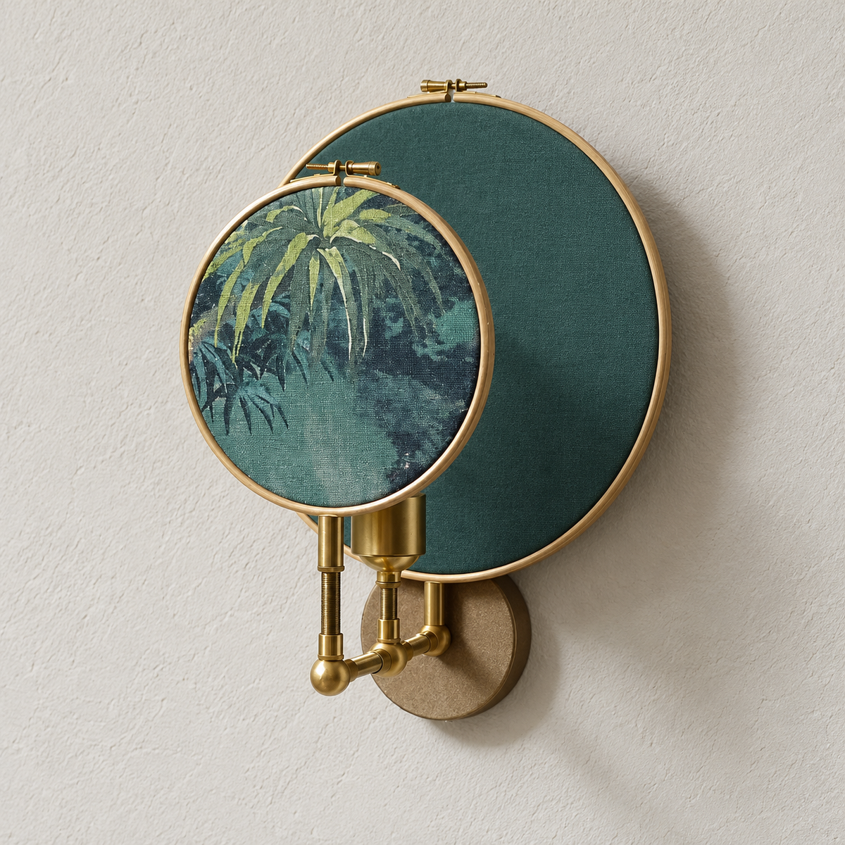 Angled view of the emerald fabric panels and brass mounting hardware.