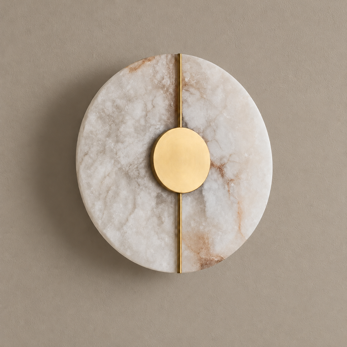 Marble and brass wall light, unlit on a stone-beige wall