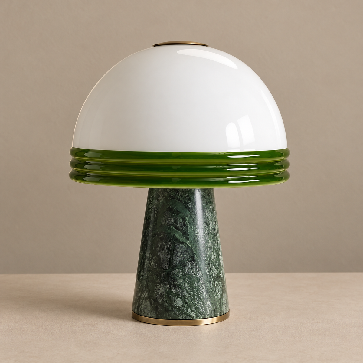 Green marble lamp with an unlit white and green glass dome.