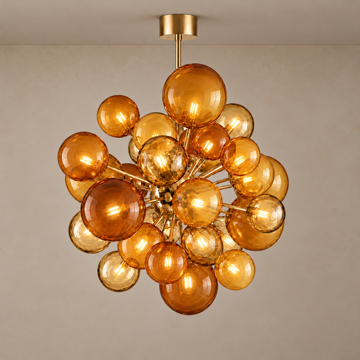 De Silva chandelier illuminated through transparent honey and cognac amber glass globes