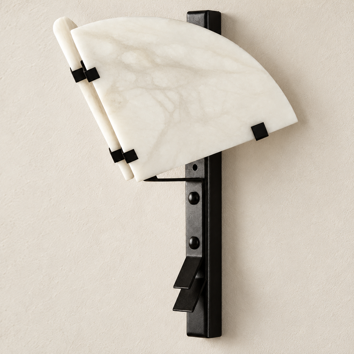 Single-tier alabaster fan wall sconce with black metal supports, switched off.