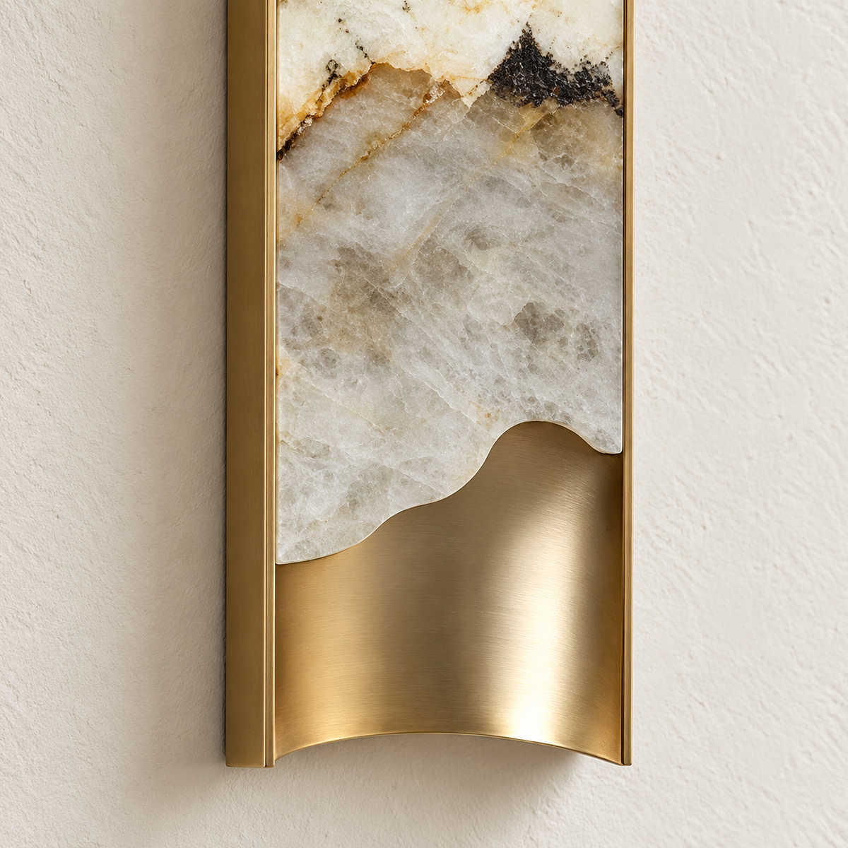 Close-up of the onyx edge and brushed brass lower section.
