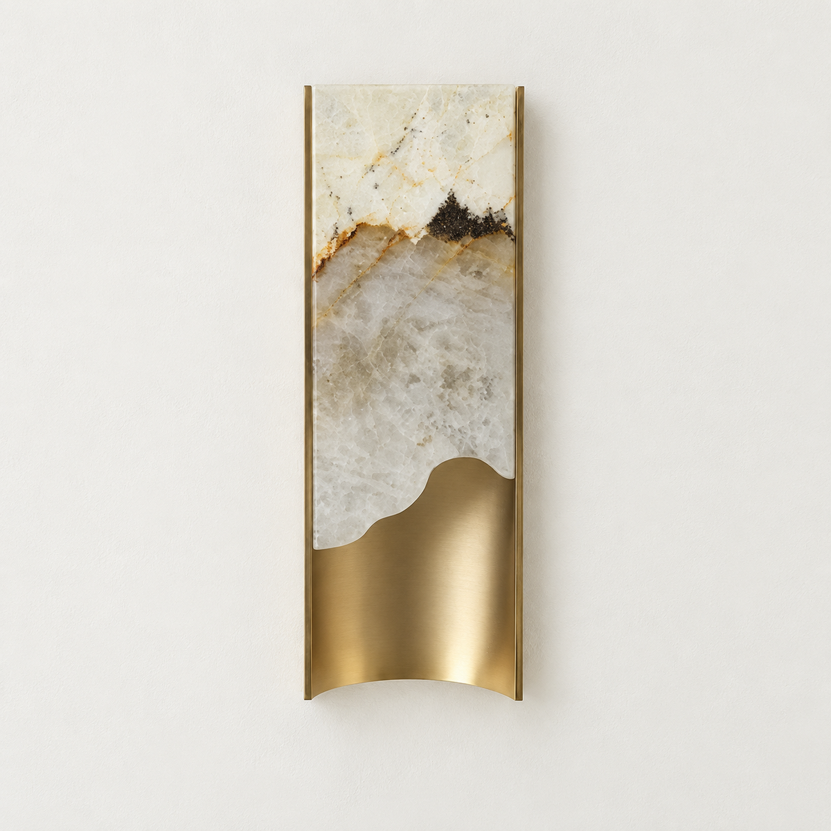 Small 40 cm onyx and brass wall sconce, switched off on ivory plaster.