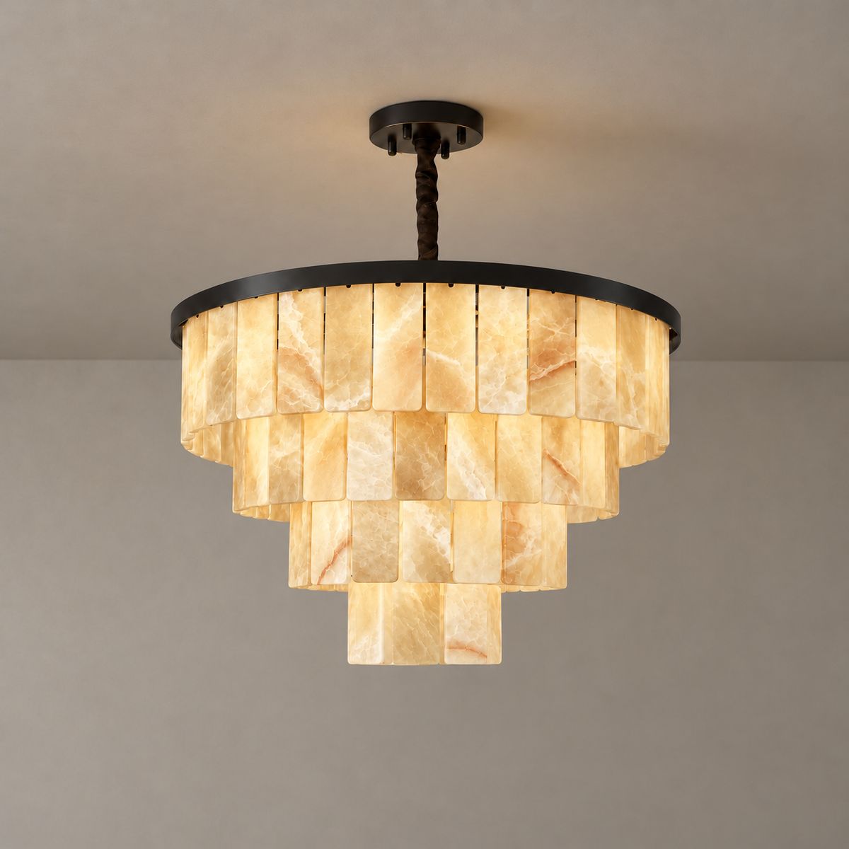 Four-tier honey onyx chandelier with black frame, illuminated.