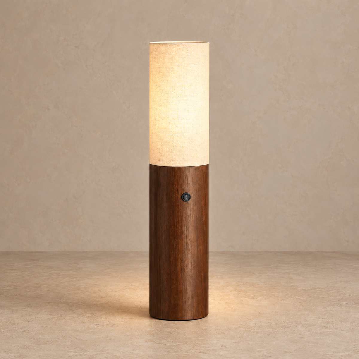 Small CLWAB25S walnut lamp with its fabric shade illuminated.