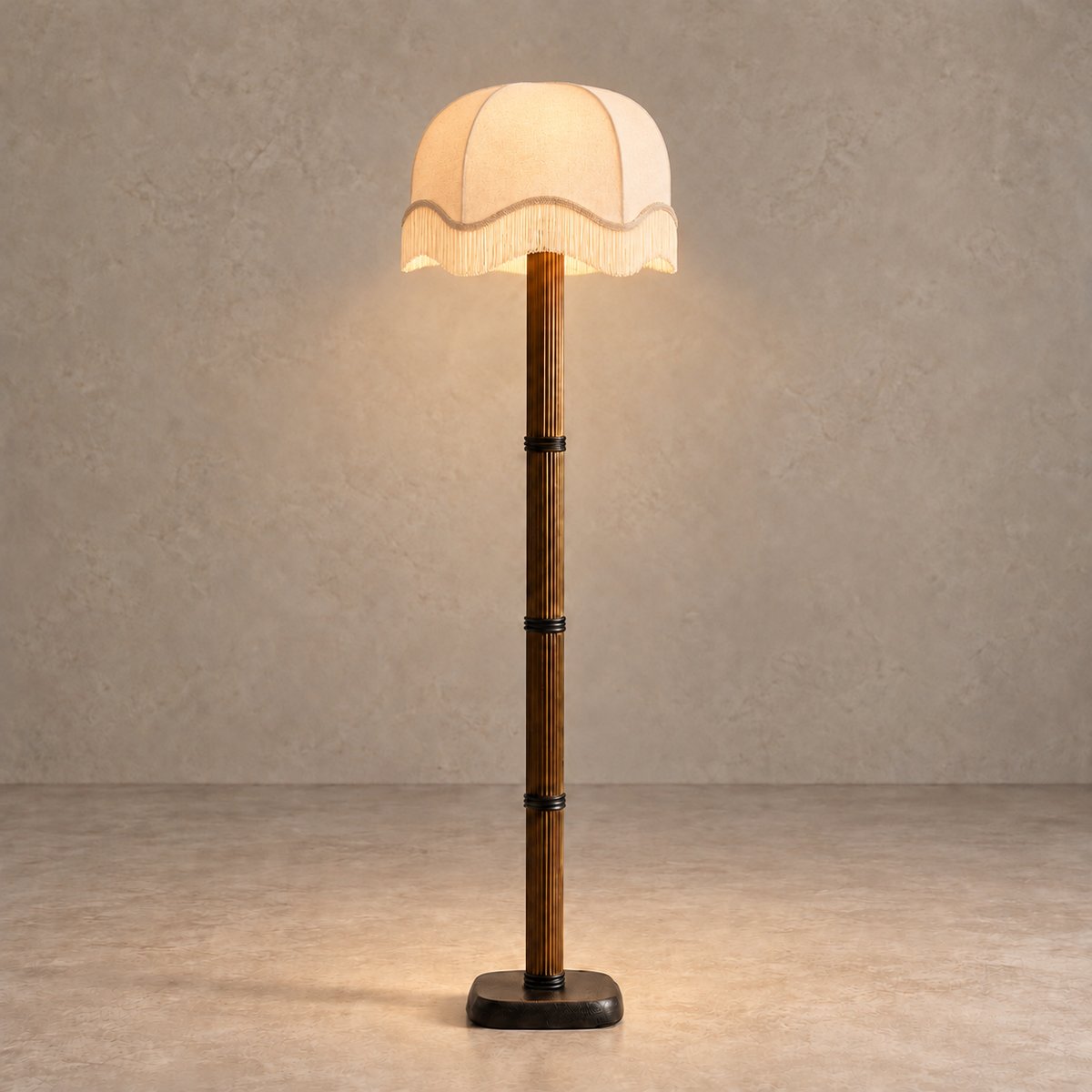 Galerie Fluted Column Floor Lamp with cream scalloped fringe shade, illuminated in natural daylight.