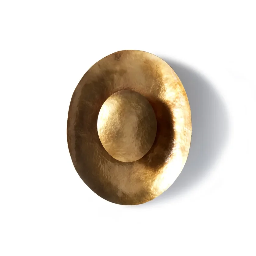 Handcrafted Brass Disc Wall Sconce – Hammered Metal Art Light for Luxury Interiors