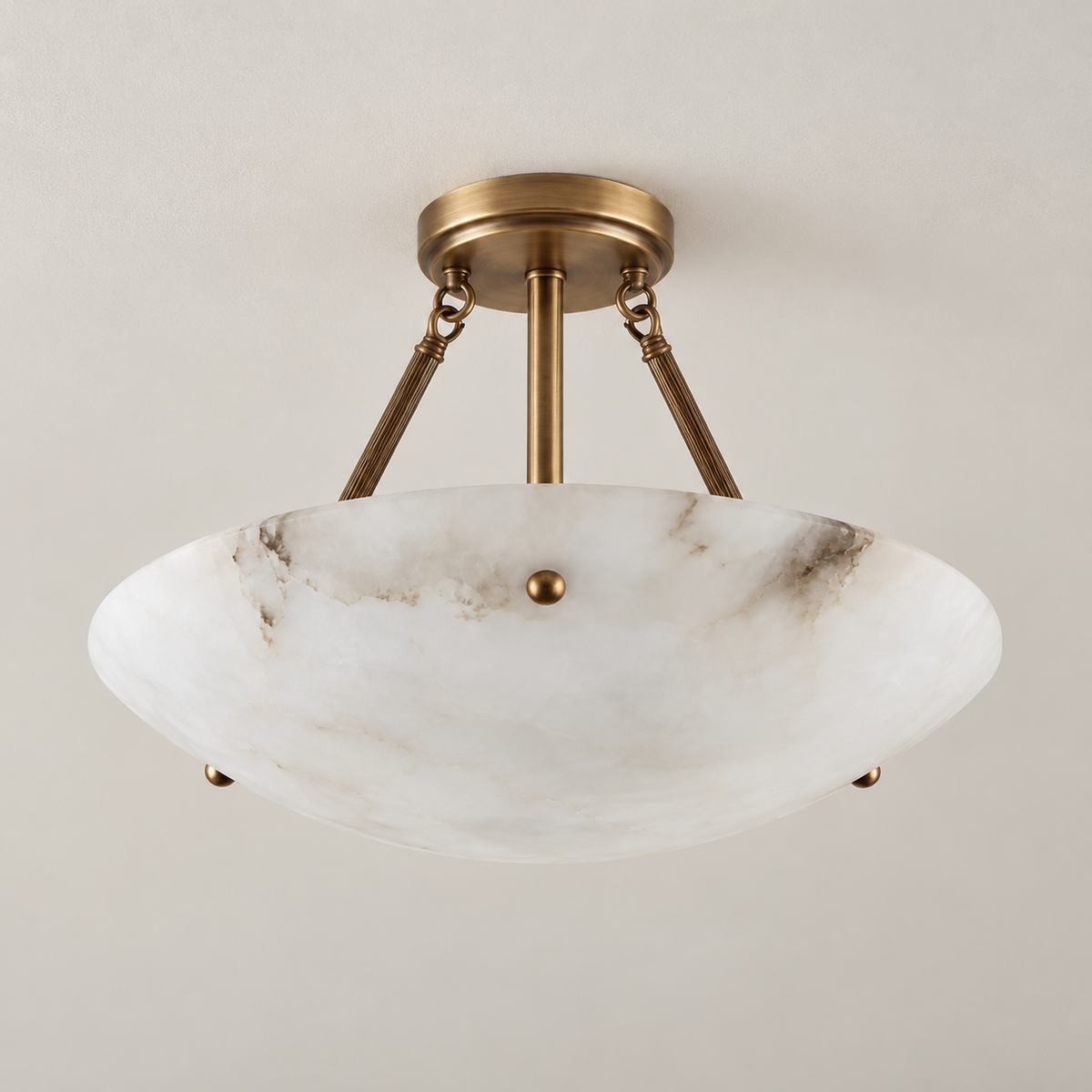 Flat Rose alabaster semi-flush ceiling light unlit, with antique brass supports.