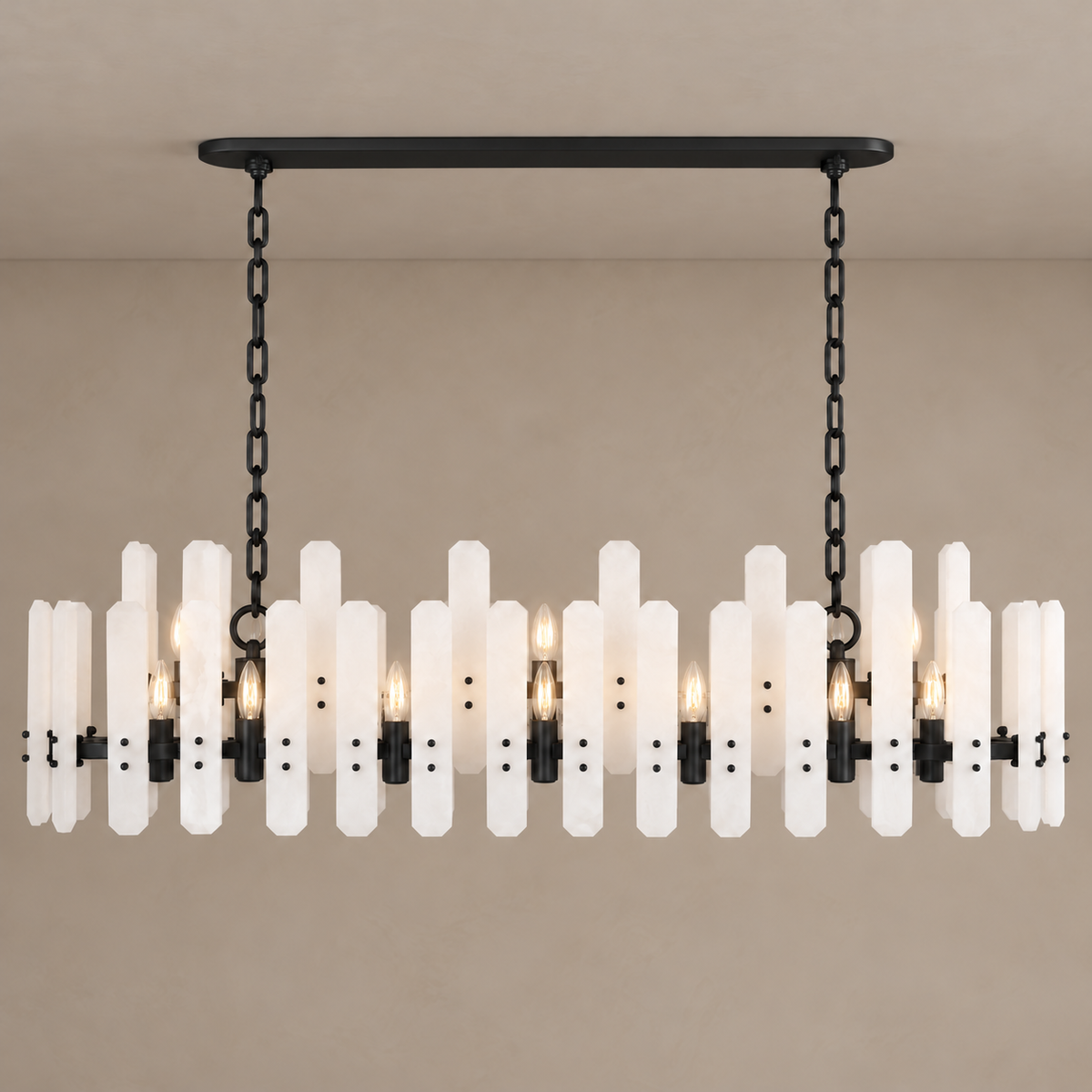 Black frosted-glass linear chandelier with its candle bulbs lit.