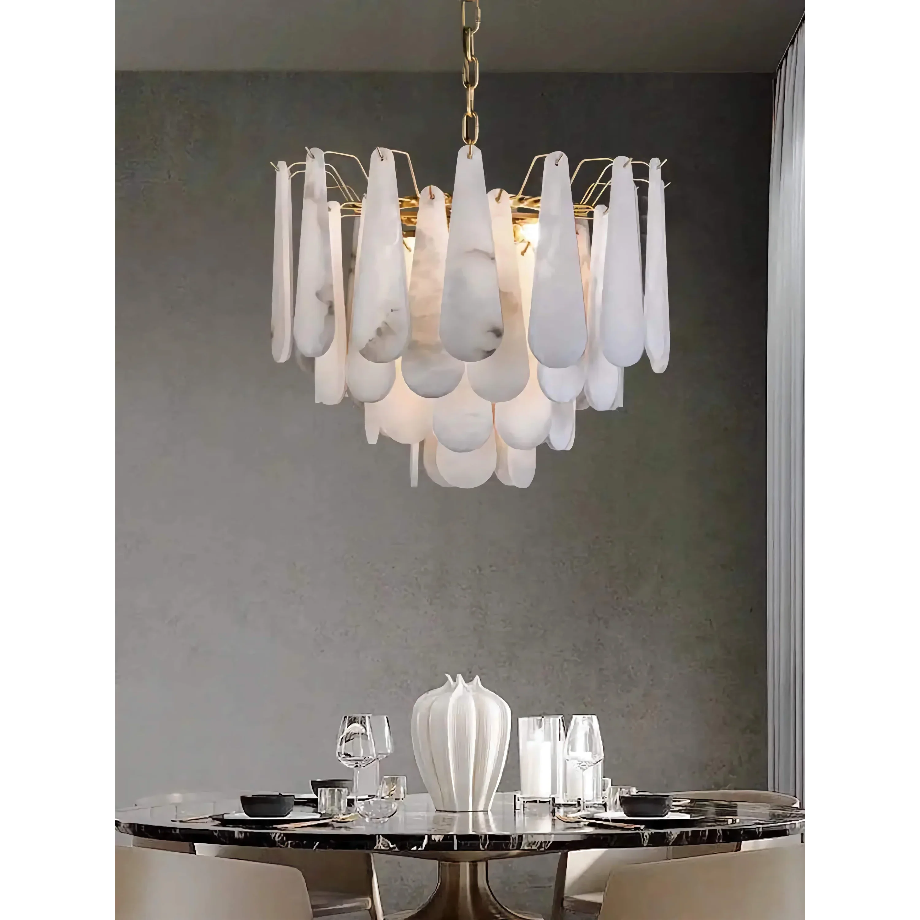 Goccia chandelier glowing warm