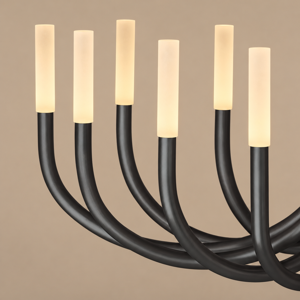 Detail of the Grand Black Candelabra’s curved black arms and illuminated cylindrical shades