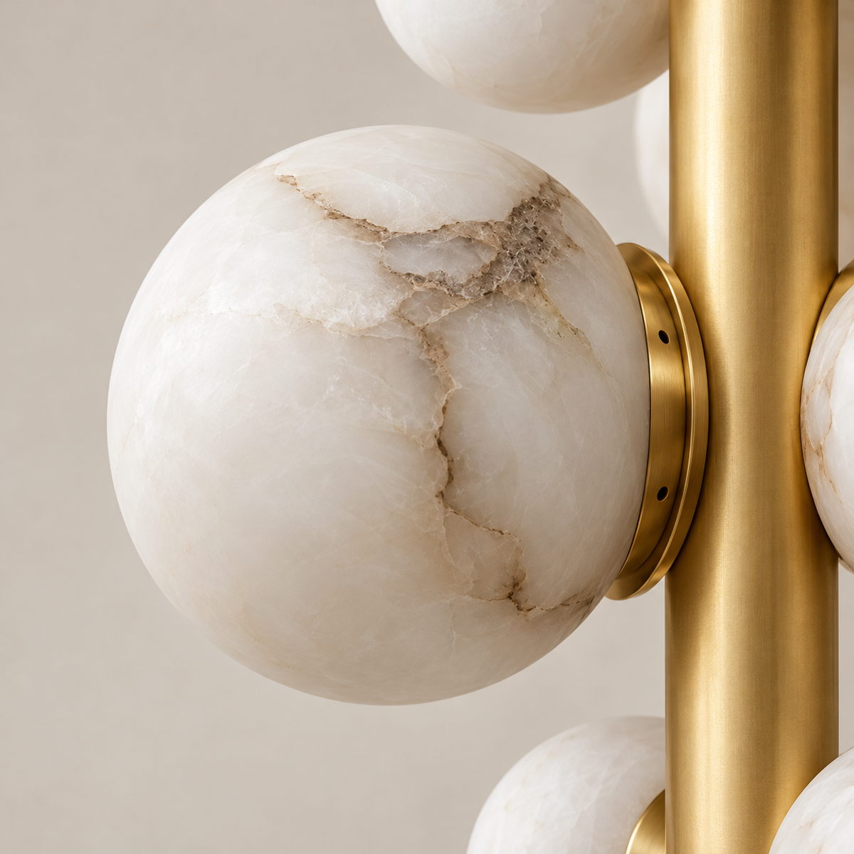 Close view of natural alabaster and brass fittings on the CLGRP chandelier.
