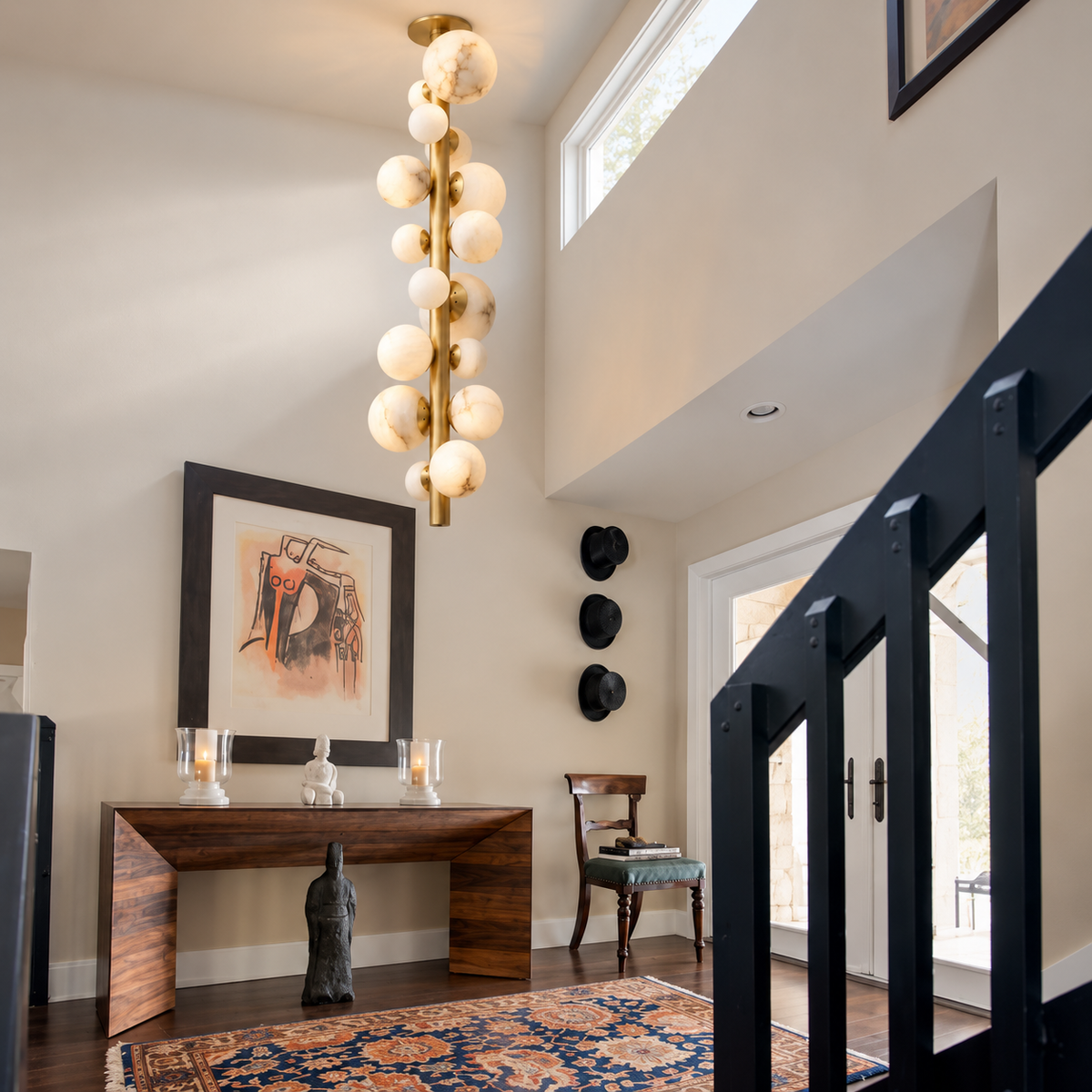 Grappolo alabaster cluster chandelier installed in a double-height entrance.