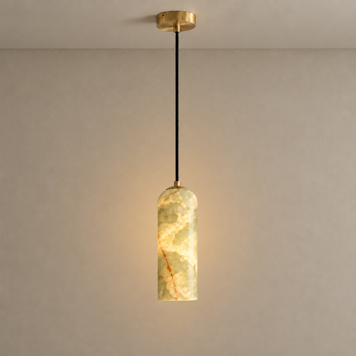 Green Onyx Column Pendant with Brass illuminated, with the same natural stone bands visible. 26 cm high × 10 cm diameter.
