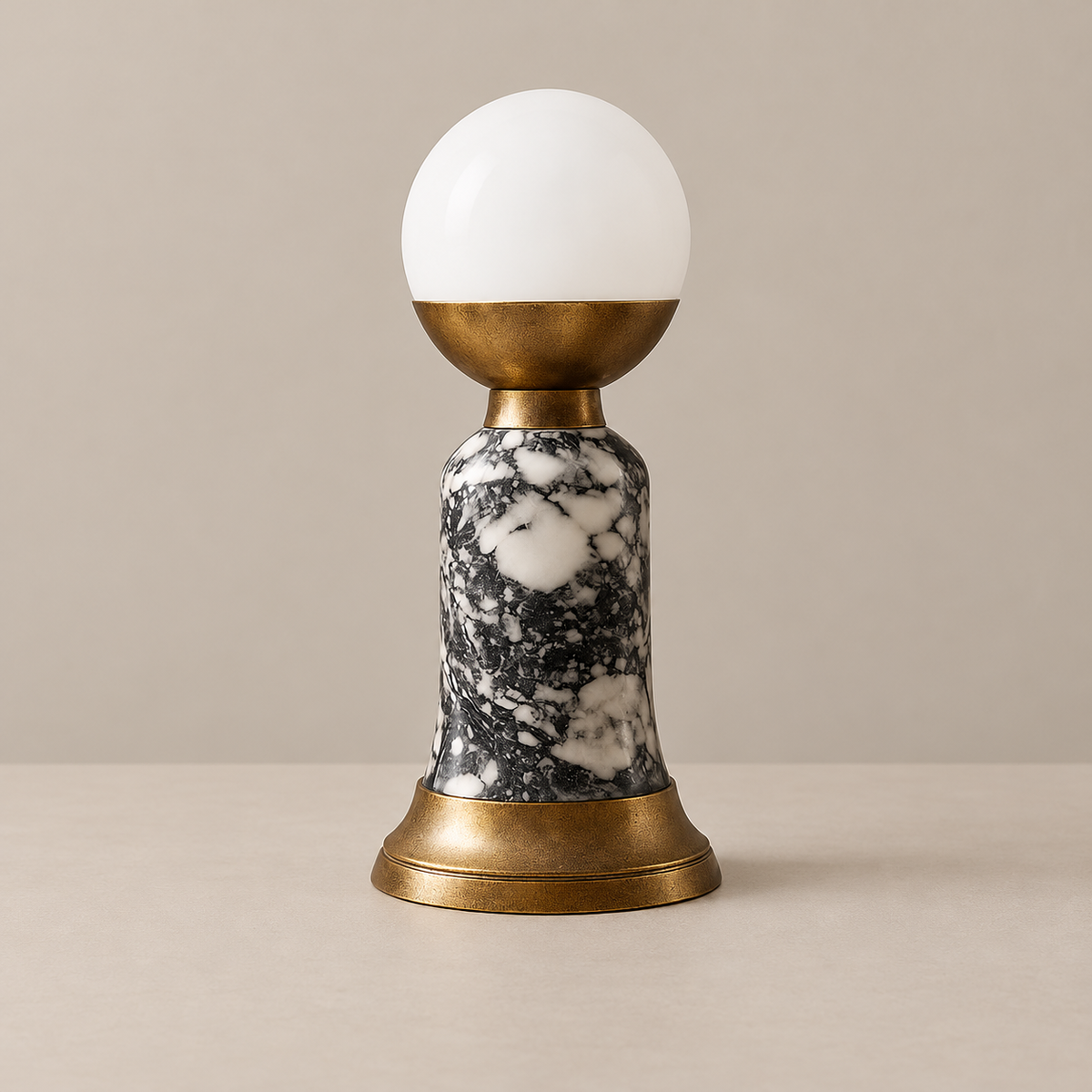 Grey Marble Table Lamp, switched off, on a beige background.