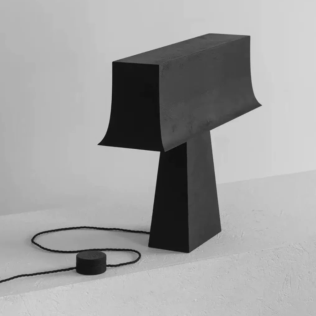 Steel table lamp glowing warm