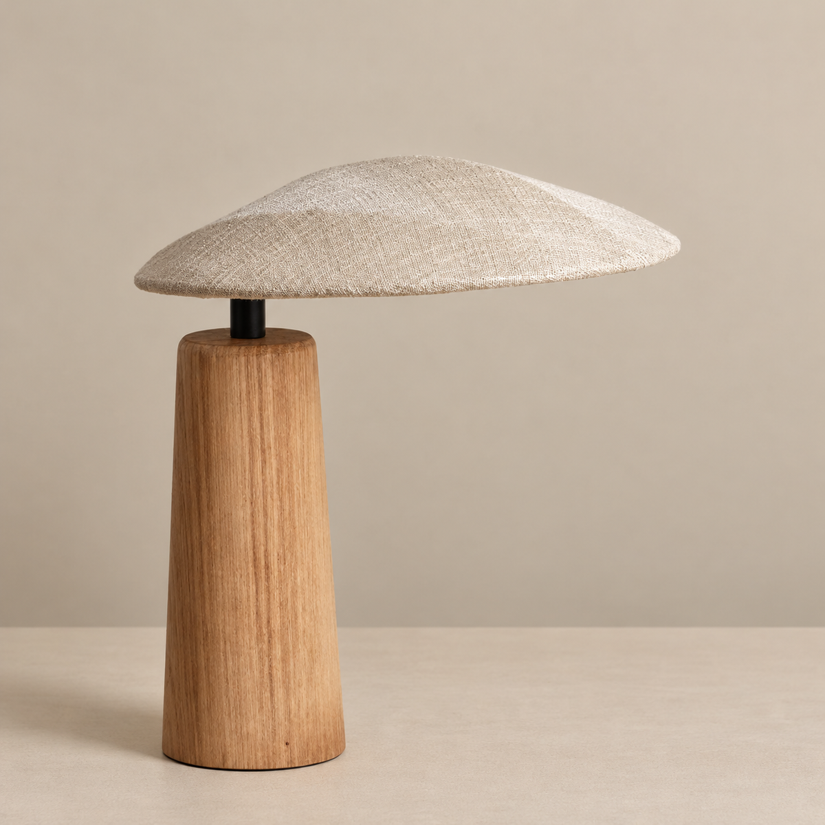 Kezawa Table Lamp, switched off, on a neutral beige background.