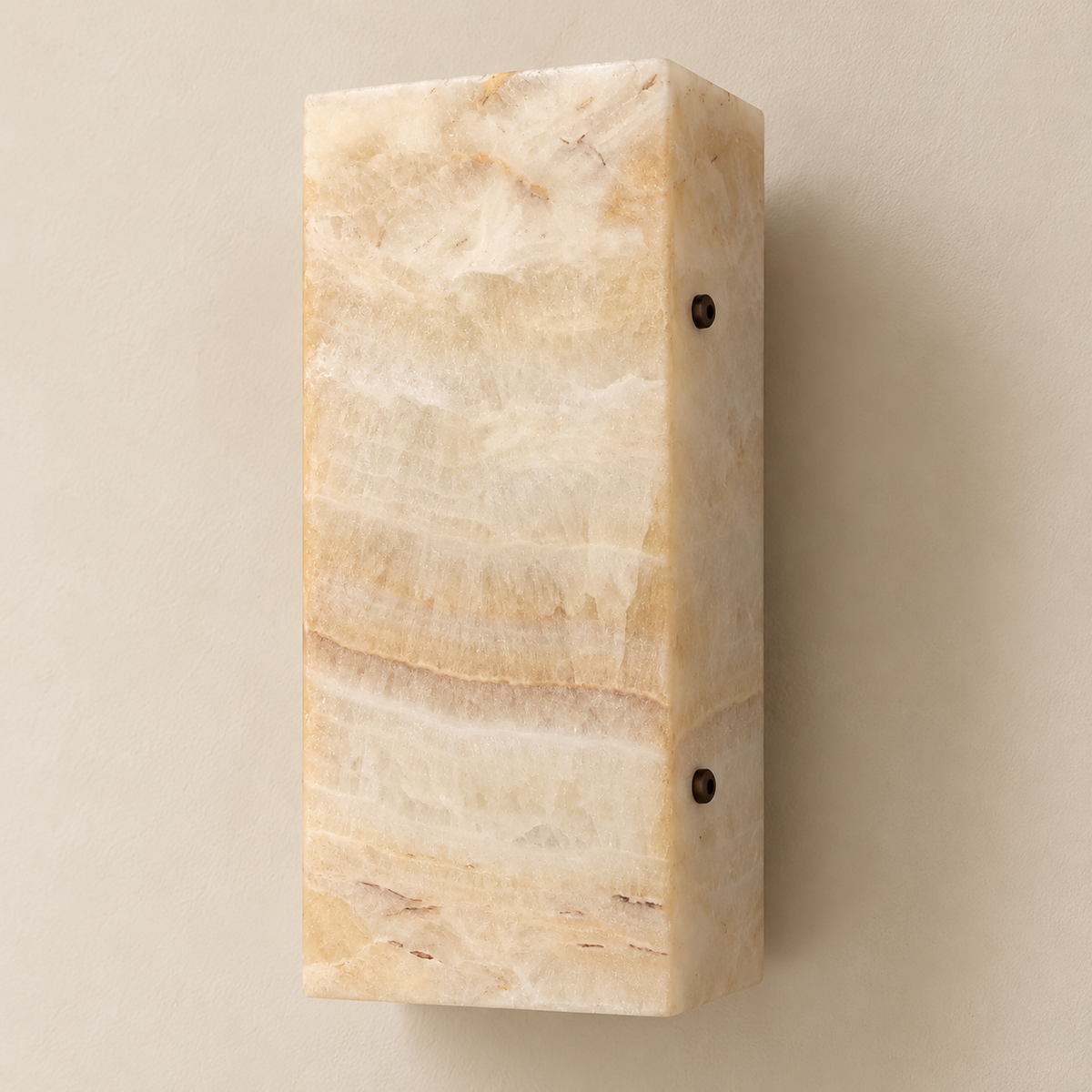 Opposite angled view of the unlit onyx wall sconce, showing its curved face and two dark bolts.