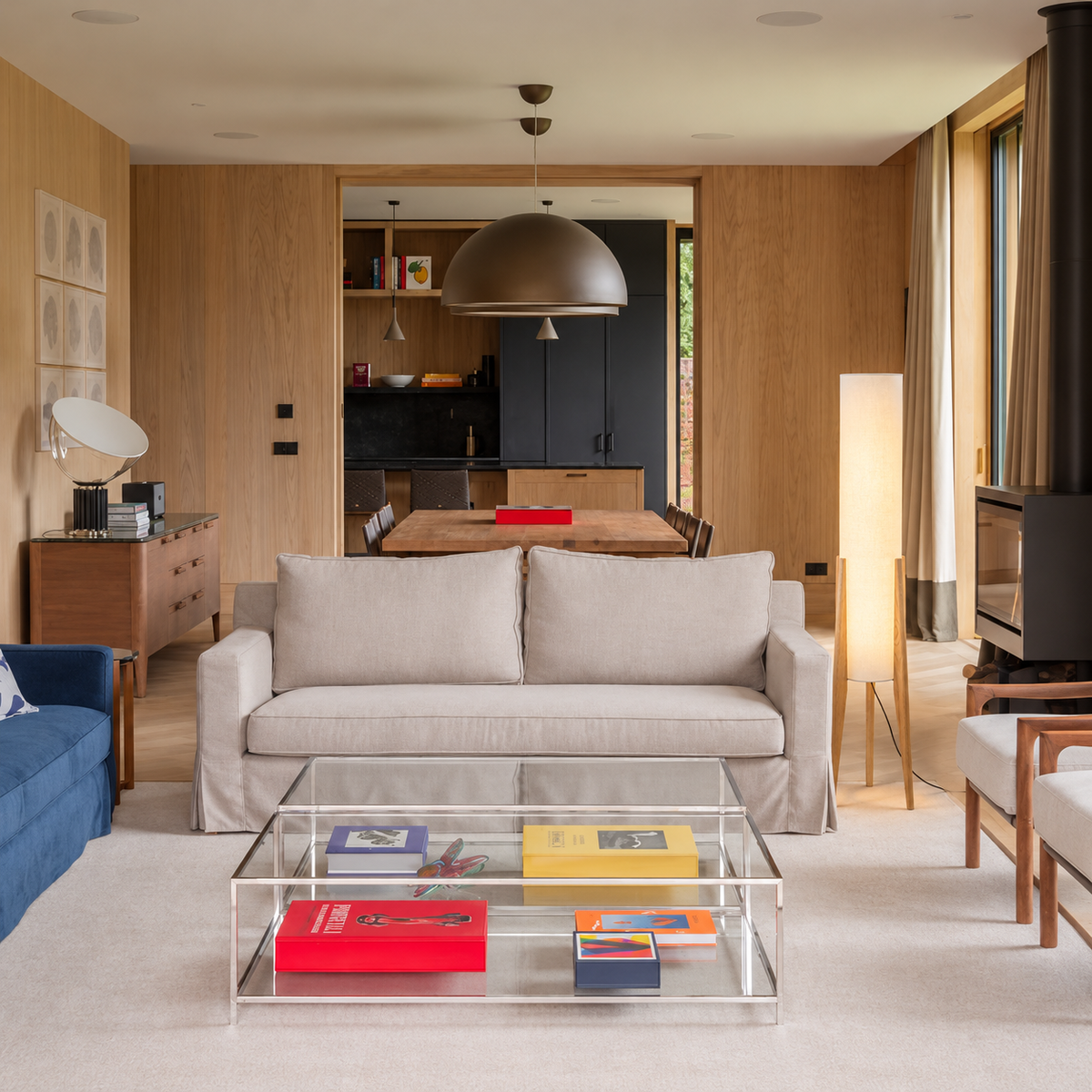 Piloni Log floor lamp beside a cream sofa in a wood-panelled living room.
