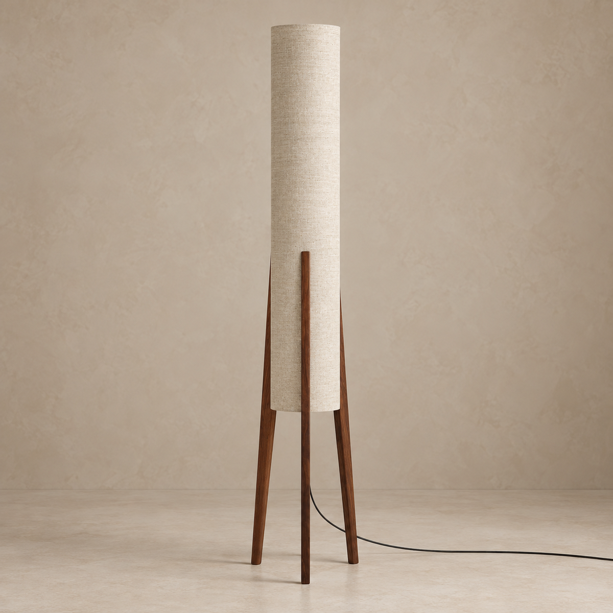 Piloni Walnut floor lamp with three dark wooden legs and unlit linen shade.