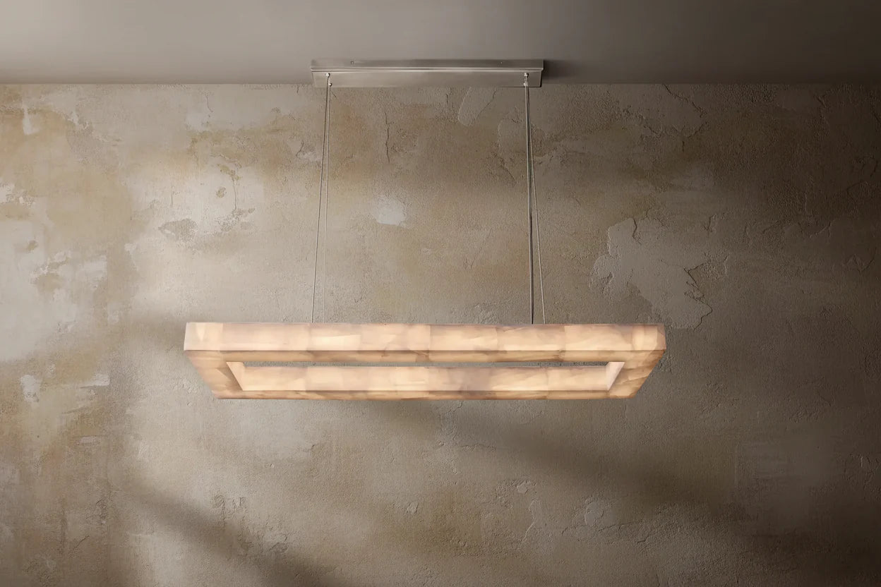 Solid alabaster frame glowing warm with natural veining