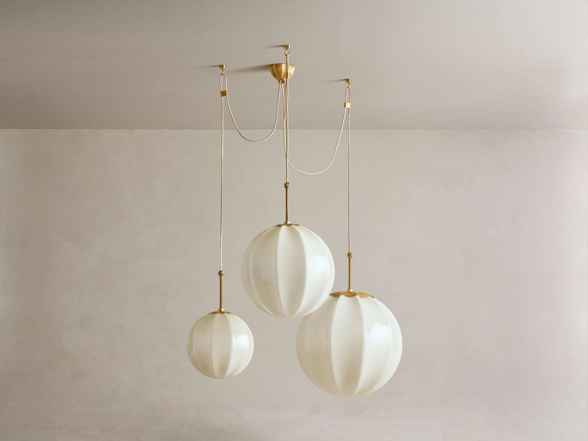 Ribbed cream glass cluster chandelier, wider spread of the three globes, unlit