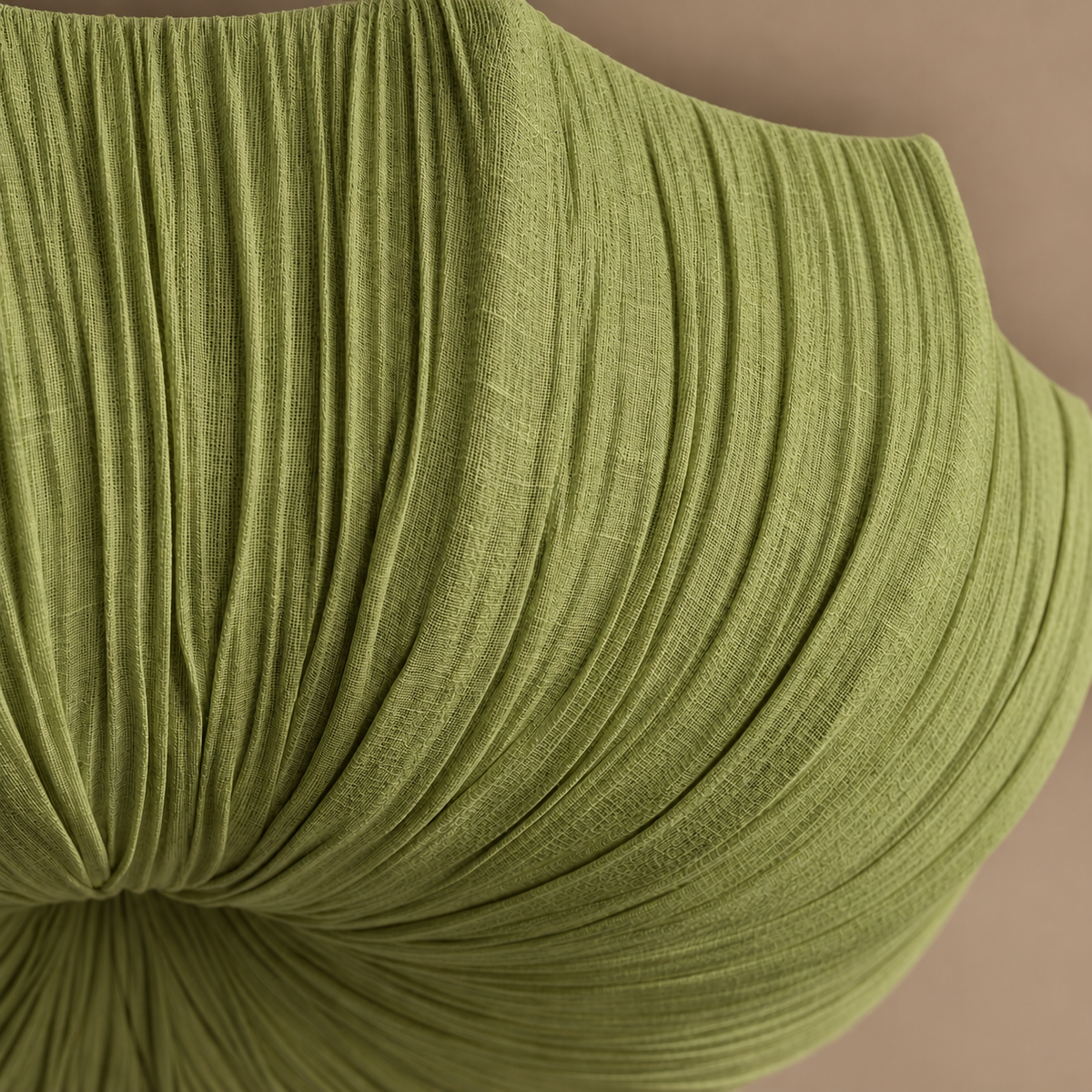 Close-up of the Sabina flush mount’s olive-green linen weave and gathered folds.