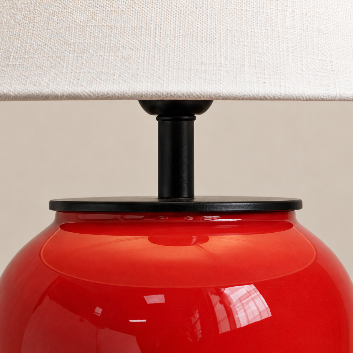 Red ceramic glaze, black neck and fabric shade detail of the Salmeri lamp