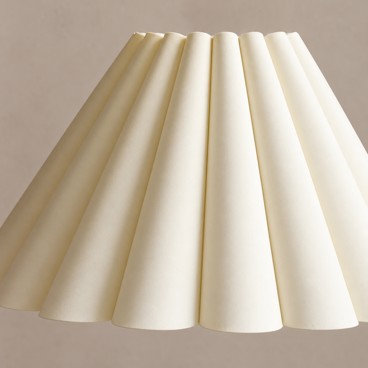 Close detail of the cream sculptural pleated shade.