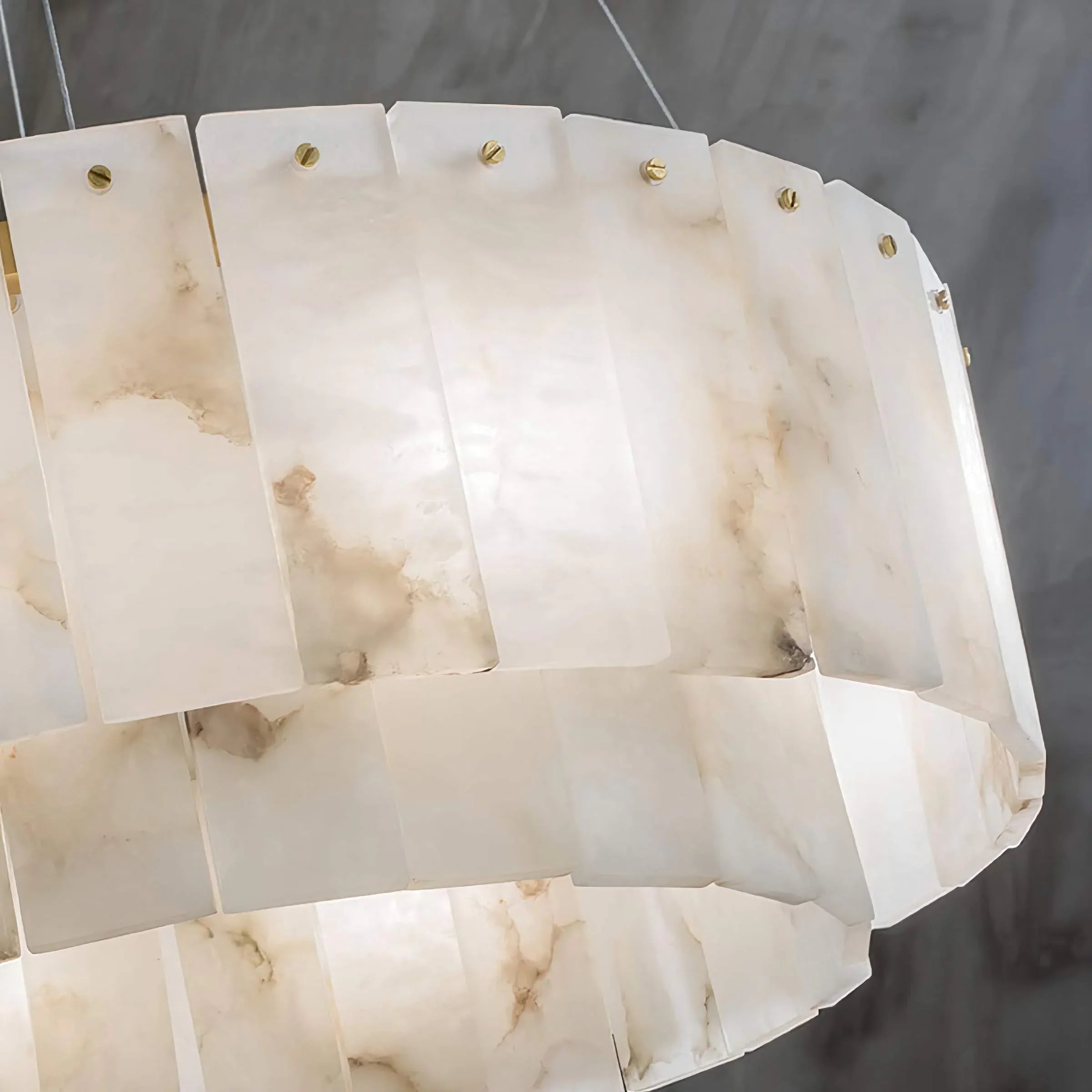 Alabaster drum chandelier floating on fine cables