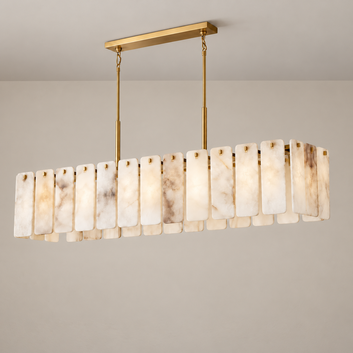 Angled view of Voltesio’s natural alabaster panels and brass fittings