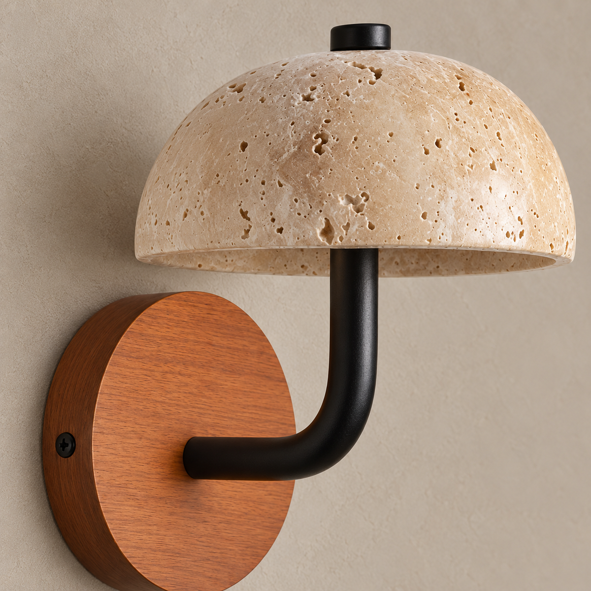 Detail of the travertine dome, curved black arm and wooden wall backplate.