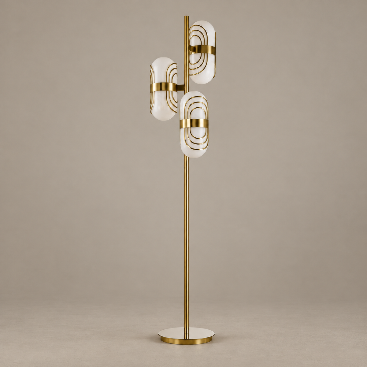 Tris floor lamp with three white glass shades and brass oval trim, switched off.
