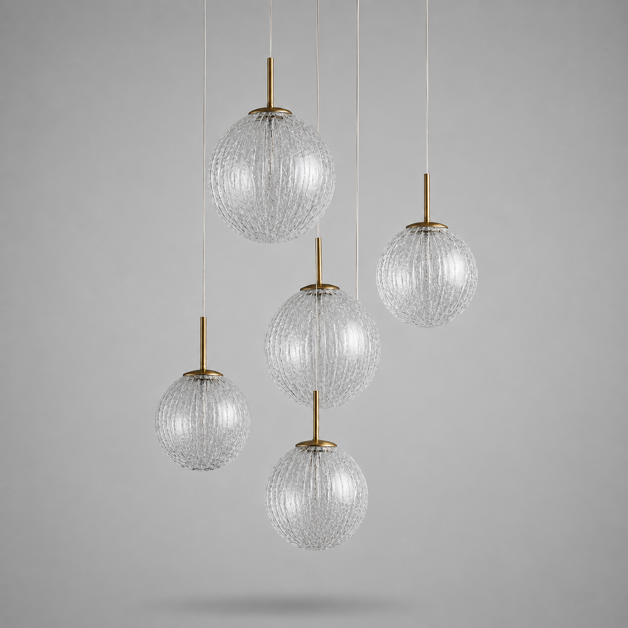 5-light colored glass and brass kitchen island pendant, unlit, showing the five glass shades — CLND008