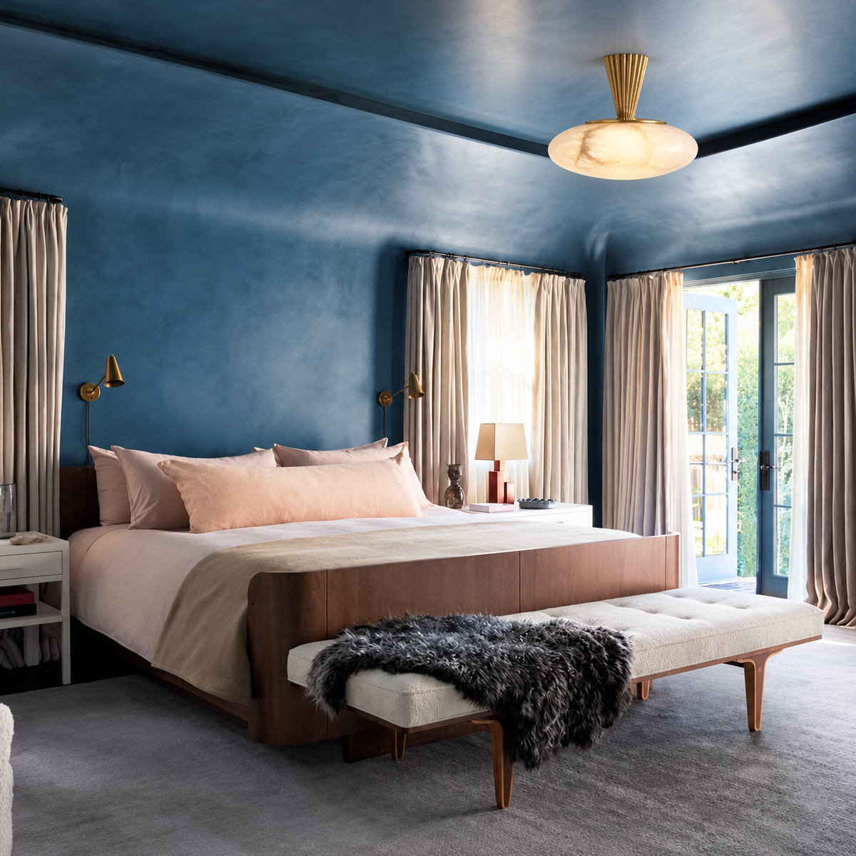 CLALF032 alabaster semi-flush light installed on the ceiling of a blue bedroom.
